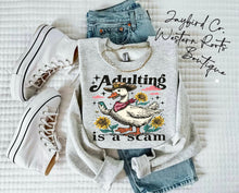 Load image into Gallery viewer, ADULTING IS A SCAM HOODIE/CREW SWEATSHIRT

