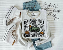 Load image into Gallery viewer, RAISING HELL AND KIDS AINT EASY HOODIE/CREW SWEATSHIRT
